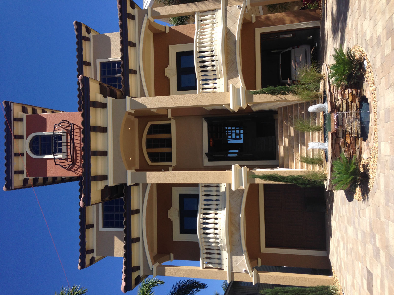 Three-story Mediterranean estate on Fort Myers Beach painted by MORA
