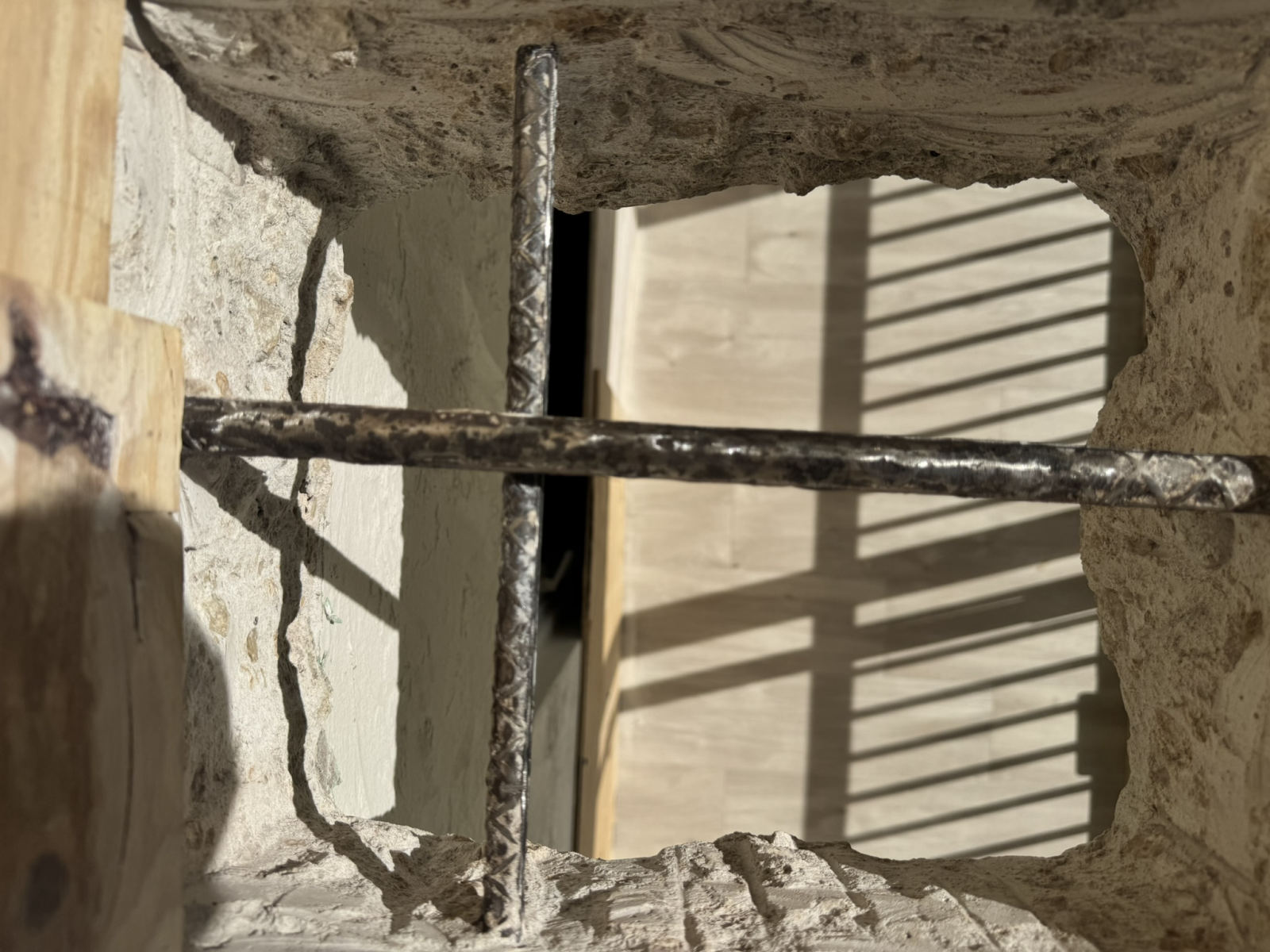 New reinforcing steel set into a concrete repair during MORA structural restoration at Vanderbilt Towers