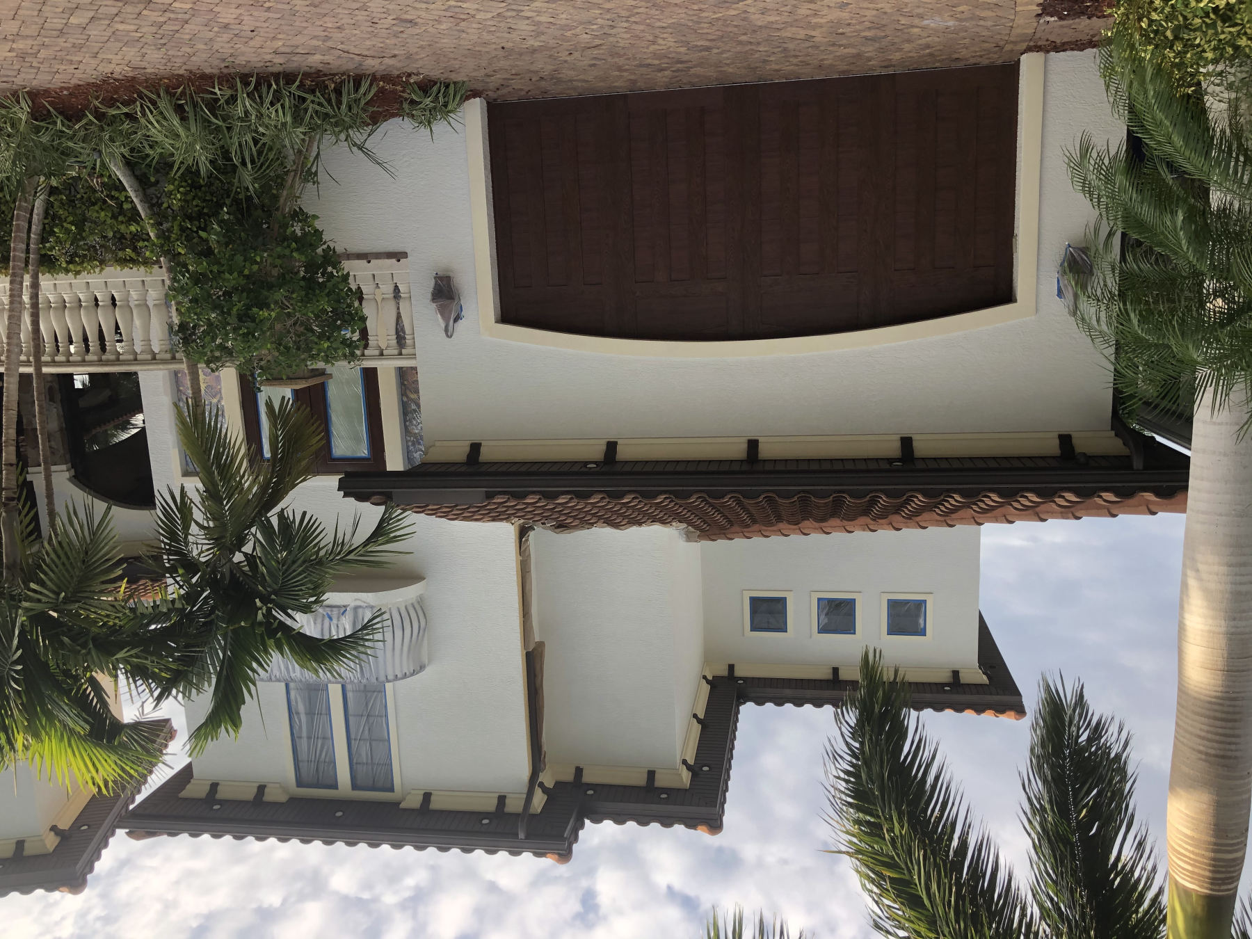 Luxury canal-front estate in Southwest Florida after a full MORA exterior repaint